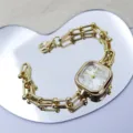 Luxury gold square watch for women, stylish link bracelet design with clear dial and quartz movement. - White