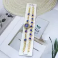Ensemble montre bracelet quartz femme avec pierres de cristal bleu et design de chaîne dorée. - Bleu
