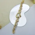 Goldene unregelmäßige hohle Quarz-Armbanduhr Detail, stilvoller Vintage Damenuhr Schmuck. - Gold Weiß