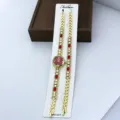 Damen Quarzuhr und Armband Set, goldfarben mit roten Kristallen und Strasssteinen. - Rotes Zifferblatt / Rot