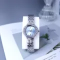Women quartz watch silver steel strap rhinestone dial detail view elegant fashion accessory - Sky Blue