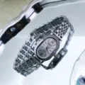Elegant oval rhinestone quartz women's watch with polished metal strap for daily style. - Silver