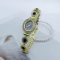 Elegante Damen Quarzuhr mit ovalem Zifferblatt Strass und modischem Goldarmband. - Gold Schwarz