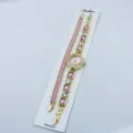 Orologio al quarzo da donna dorato e bracciale tennis con zirconi rosa eleganti. - Rosa