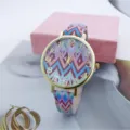 Korean style fashion quartz watch with colorful zig zag pattern dial and comfortable leather strap. - Two-Tone Red