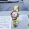 Close-up of gold quartz women watch featuring pink rhinestone dial and wavy metallic strap. - Glitter Red