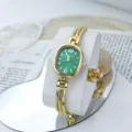 Elegante reloj de pulsera de cuarzo para mujer con esfera verde ovalada y correa dorada. - Verde