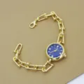 Montre chaîne dorée pour femmes, montre à quartz élégante avec cadran bleu foncé. - Bleu