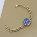 Elegante Damen Gold Quarzuhr mit blauem quadratischen Zifferblatt und modischem Gliederarmband. - Saphirblau