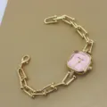 Modische quadratische Quarzuhr mit goldfarbenem Gliederarmband für elegante Damen. - Rosa