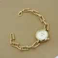 Women gold chain quartz watch elegant fashion wristwatch with U-shaped links design detail view - Gold