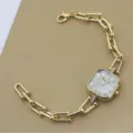 Elegante goldfarbene quadratische Uhr mit klobigem U-Glieder-Armband für Damen Mode. - Grau