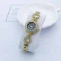 Elegante Damen Quarzuhr mit Strass Steinen, stilvolles goldenes Armbanduhr Design für Frauen. - Goldschwarz