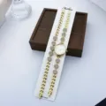 Damen Quarzuhren Armband Set mit glitzernden Strasssteinen, elegantes goldenes Modedesign. - Weiß