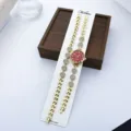Damen Quarz Modeuhr Armband Set mit funkelnden Strasskristallen kleines Zifferblatt - Rot