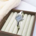 Elegant clover bangle quartz watch with sparkling rhinestones and grey dial for women daily wear. - Rhinestone Style / Silver Black