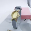 Reloj de cuarzo ovalado para mujer de moda con pedrería brillante y correa de nailon gris - Gris