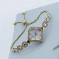Elegante dames kwartshorloge met klaverblad vorm, schitterende kristallen en ketting. - Goud Wit