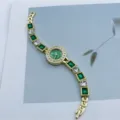 Women's gold quartz watch with green dial and rhinestone crystal bracelet chain design. - Green