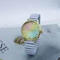 Fashion gradient rainbow dial quartz watch with white stretch metal band for women. - White
