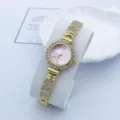 Elegante goldene Strass Quarz Damenuhr mit rosafarbenem Zifferblatt und Armband Modeschmuck. - Gold & Rosa