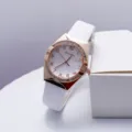 Exquisite detail of women quartz watch with white PU leather strap and rhinestone bezel. - White