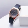 Women quartz watch with rhinestone bezel and leather strap. Elegant fashion timepiece. - Black