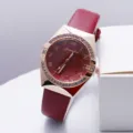 Stylish women's quartz watch featuring a red PU leather strap and dazzling rhinestone bezel. - Red
