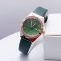 Women quartz watch with green PU leather strap, rose gold rhinestone bezel and textured dial. - Green