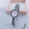 Damen Strass Quarzuhr rosa Zifferblatt elegante Kristall Armbanduhr fuer den Alltag - Lila
