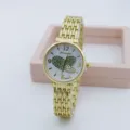 Elegante goldene Damen Quarzuhr mit Strass Herz Zifferblatt und schickem Ketten Armband. - Herz Grün / Gold