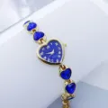 Dames quartz horloge in hartvorm met blauwe kristallen armband en gouden kast. - Goud Blauw