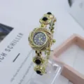 Élégante montre quartz pour femme en or avec cadran à fleurs strass et bracelet perles. - Noir Doré