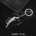 Cool metal revolver gun model keychain, alloy simulation weapon keyring for bags and cars. - Gun No. 35 Keychain