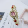 Modische Strass Blumen Quarz Damenuhr, elegante goldene Armbanduhr für Frauen neu. - Gold Rot