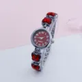 Women quartz watch with red dial and butterfly rhinestone bracelet strap for daily wear. - Silver Red