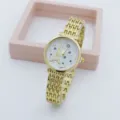 Elegante Damen Gold Quarzarmbanduhr mit Eiffelturm Zifferblatt und modischem Metallarmband. - Turm Schwarz / Gold