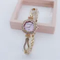 Elegant rhinestone flower quartz watch for women with pink dial and chic metal strap. - Rose Gold Purple