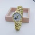 Gold quartz watch detail view, elegant butterfly dial design with metallic mesh bracelet. - Butterfly (3305-10) / Black