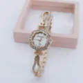 Close-up detail view of women rhinestone floral quartz watch with rose gold bracelet links. - Rose Gold White