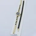 Elegante goldfarbene Quarzuhr und Armband-Set mit schwarzen Kristallen für Damen. - Schwarz