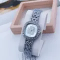 Detail view of luxury rhinestone square quartz watch with silver metal strap for women fashion. - Silver Sky Blue