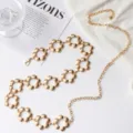 Cinturón de cadena de flores doradas para mujer, cadena de cintura metálica, accesorio boho. - Dorado