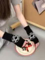 Schwarze und weiße Pentagramm Strick-Fingerlos-Handschuhe für Lolita und den JK-Style. - Fingerlose Handschuhe / Schwarzes Pentagramm