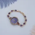 Elegante Damen Quarz Uhr mit violetten Kristallen Gold Armbanduhr modisches Accessoire - Lila