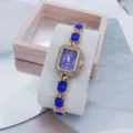 Elegante goldfarbene Damen Quarzarmbanduhr mit blauem Zifferblatt und funkelnden Kristallsteinen. - Roségold Blau