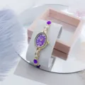 Elegante reloj de cuarzo para mujer con esfera ovalada morada y correa de cadena. - Púrpura