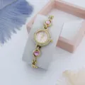 Prachtige strass-quartzhorloge met roze hartarmband, elegante dametjesdetailfoto. - Goud & Roze