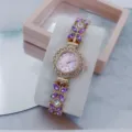 Women fashion quartz watch with purple crystal flower bracelet strap and gold alloy case detail shot. - Rose Gold Purple