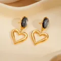 Boucles d'oreilles en acier titane doré avec pierre œil de chat, style rétro élégant. - Boucles d'Oreilles Ovales Noires Cœur Creu